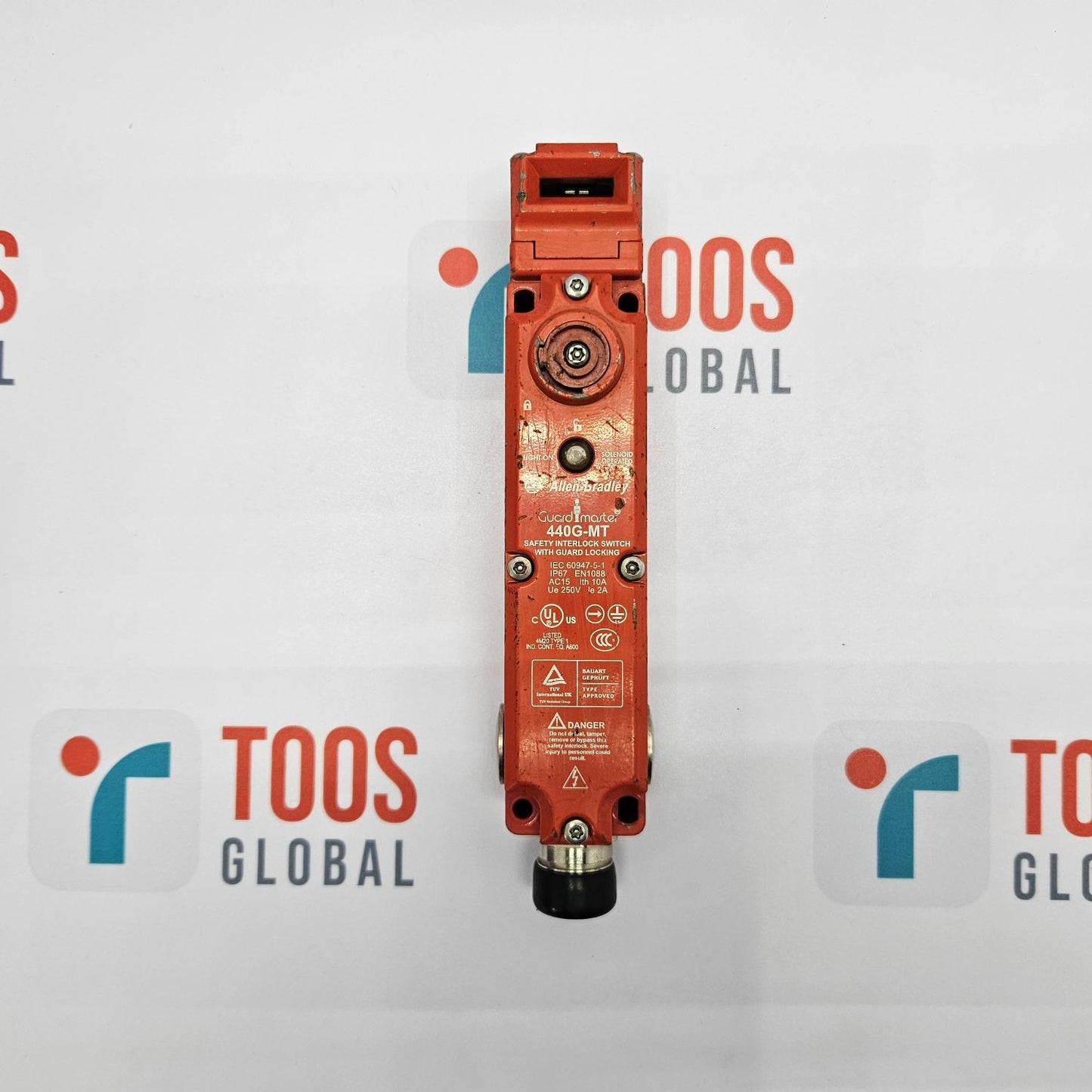 Red industrial component on a white background with 'TOOS GLOBAL' branding.