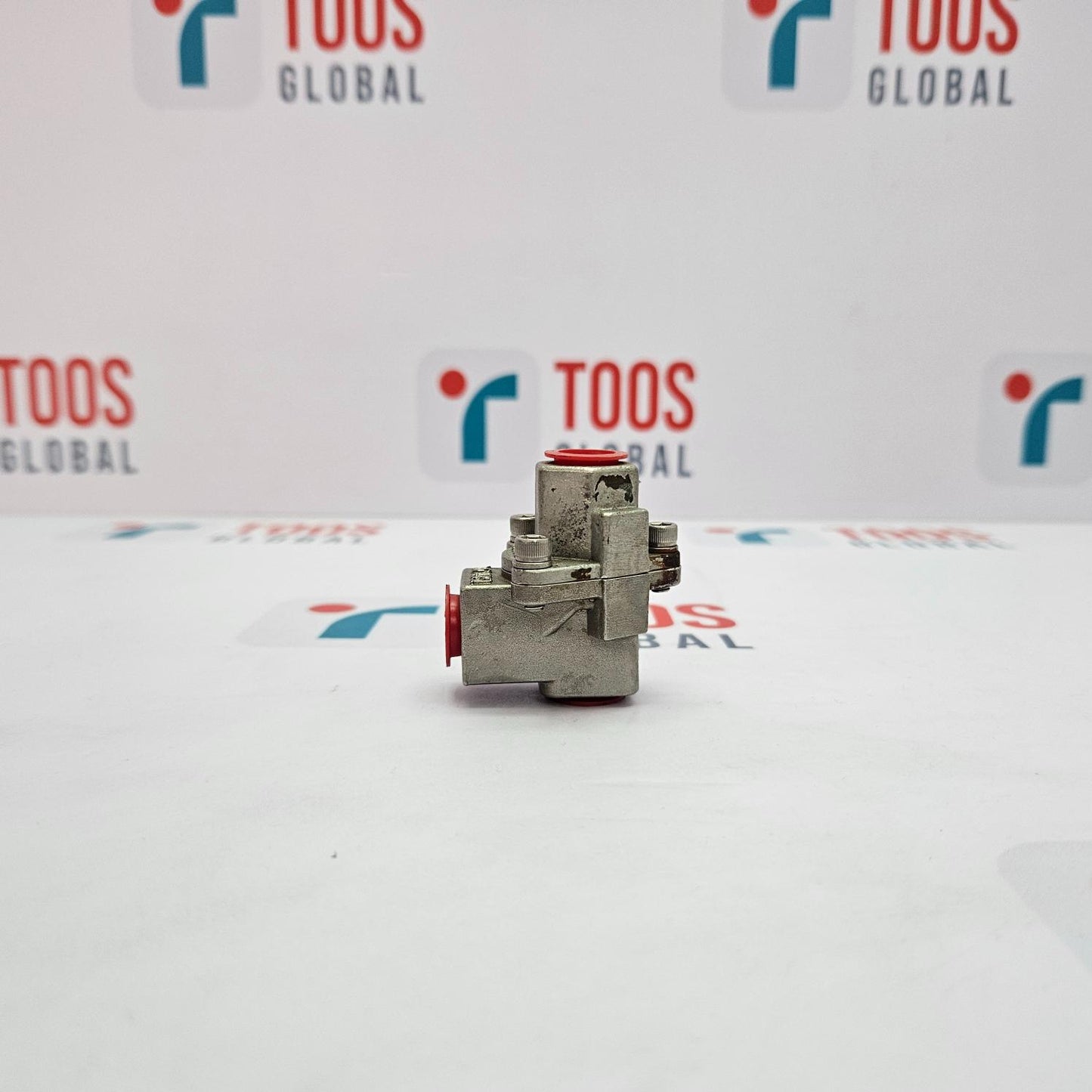 Metallic valve component on a white background with logos.
