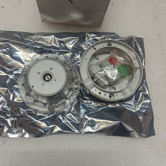 AUTRONICA 116-BG-201 AUTROFLAME IR FLAME DETECTOR on a reflective surface with a cardboard box in the background.