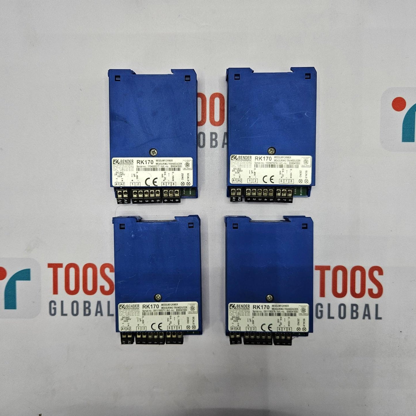 Four blue electronic modules on a TOOS Global branded background