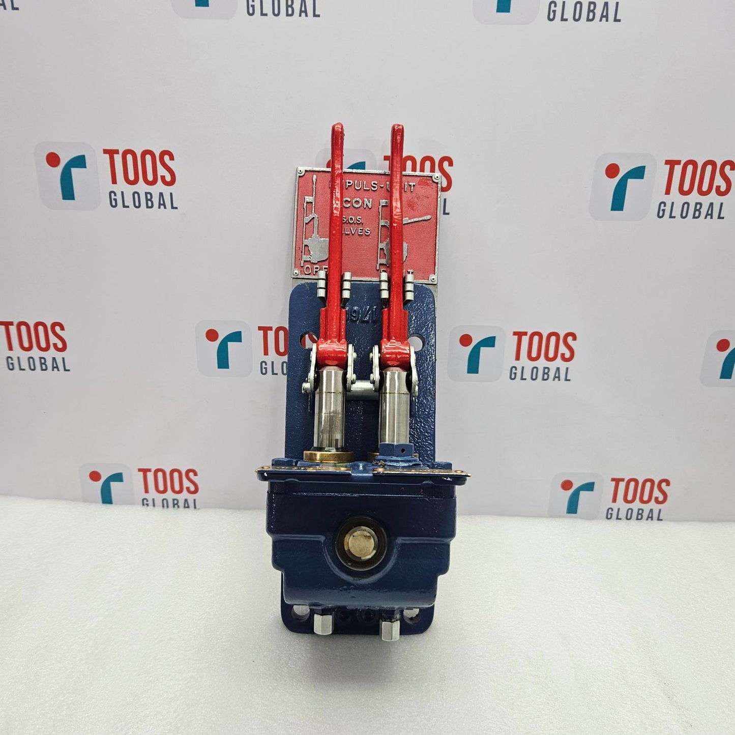 Mechanical component with red and blue parts on a white background with 'TOOS GLOBAL' branding.