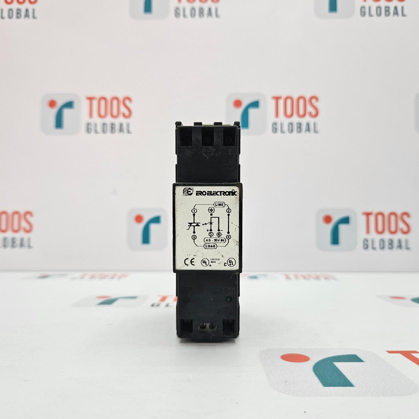 Black electronic component on a white background with 'TOOS GLOBAL' branding.