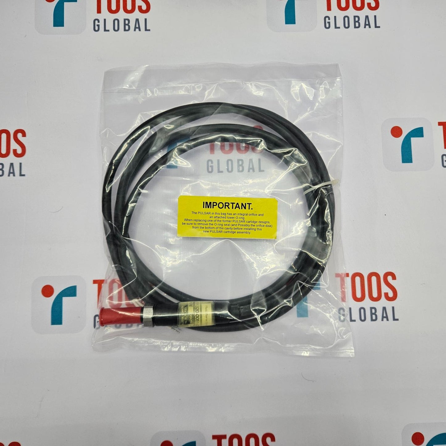 VS1320-0051-001 a yellow label in clear packaging on a TOOS GLOBAL branded background
