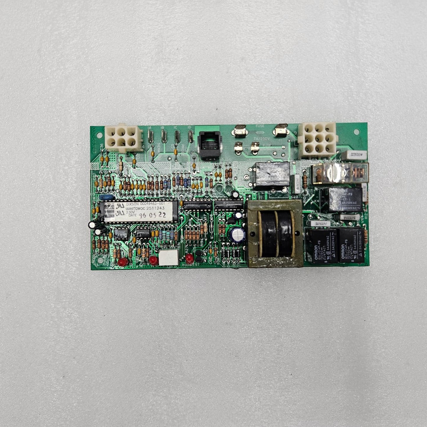 Electronic circuit board on a gray background