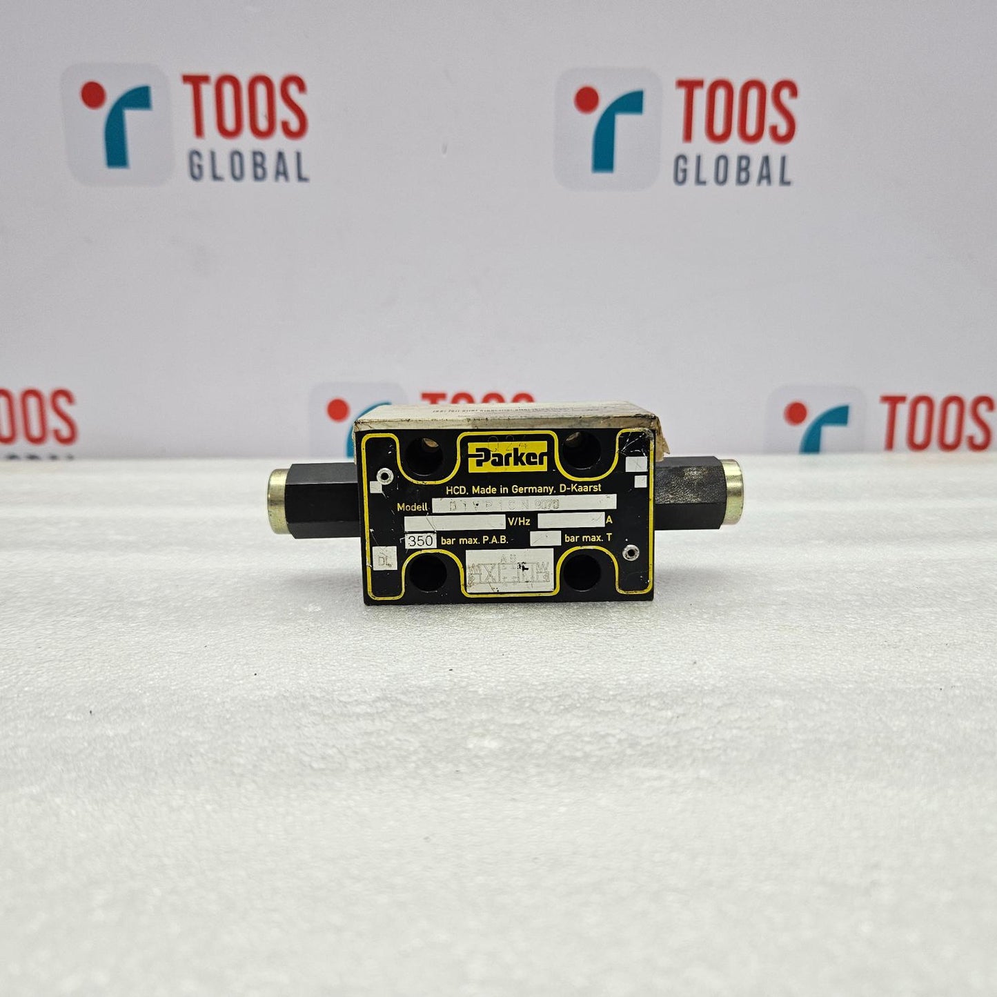 PARKER D1VP1CN9070 PILOT VALVE Parker component on a white surface with 'TOOS Global' branding in the background.