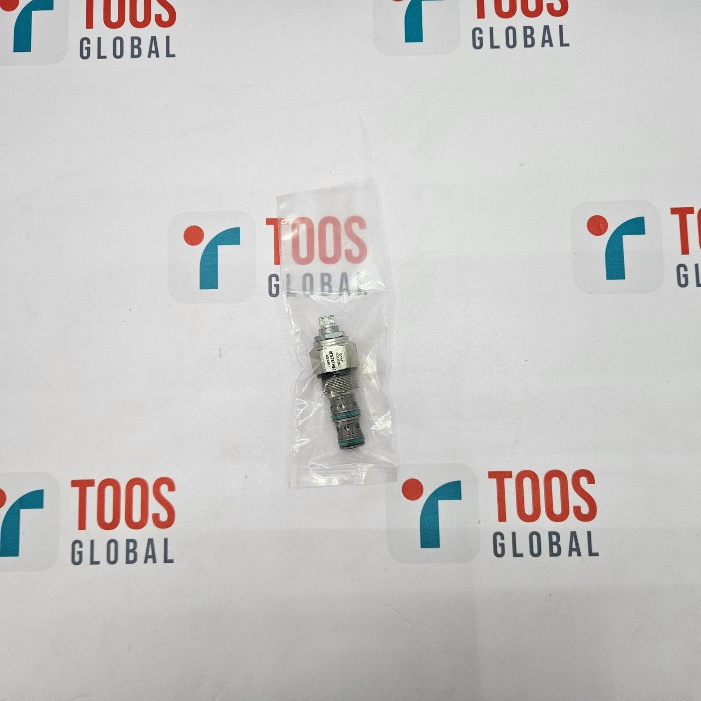 Parker PRH101S30 Pilot Operated Pressure Reducing Relieving Valve, packaged in a clear plastic bag with a white background, displaying the product prominently in the center.