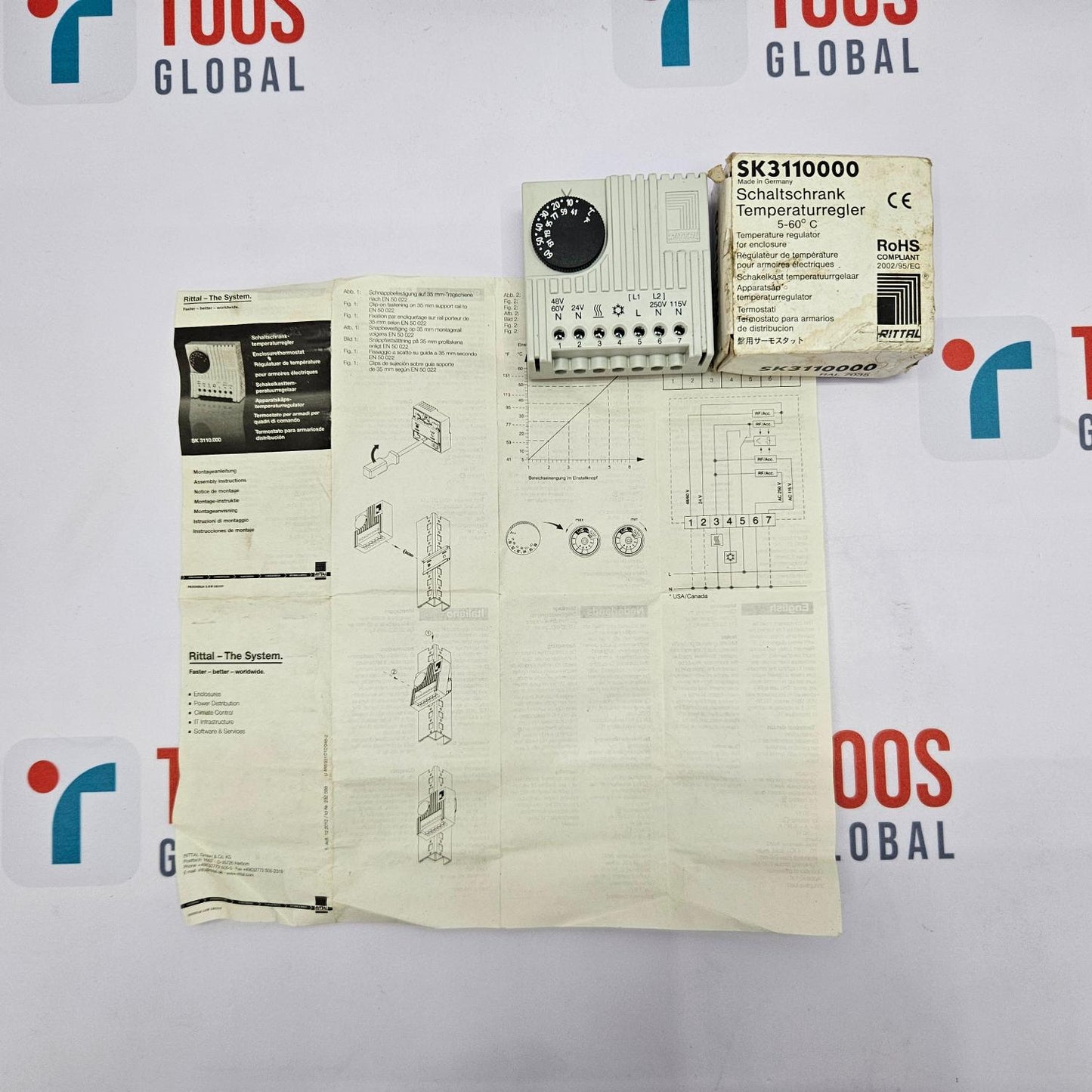 Technical manual and device on a white background with 'Tous Global' branding.