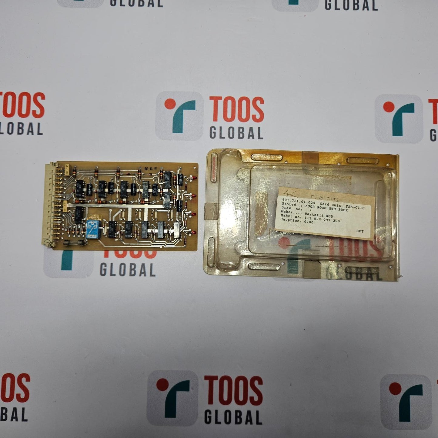 Electronic components in a clear plastic package on a TOOS Global branded background