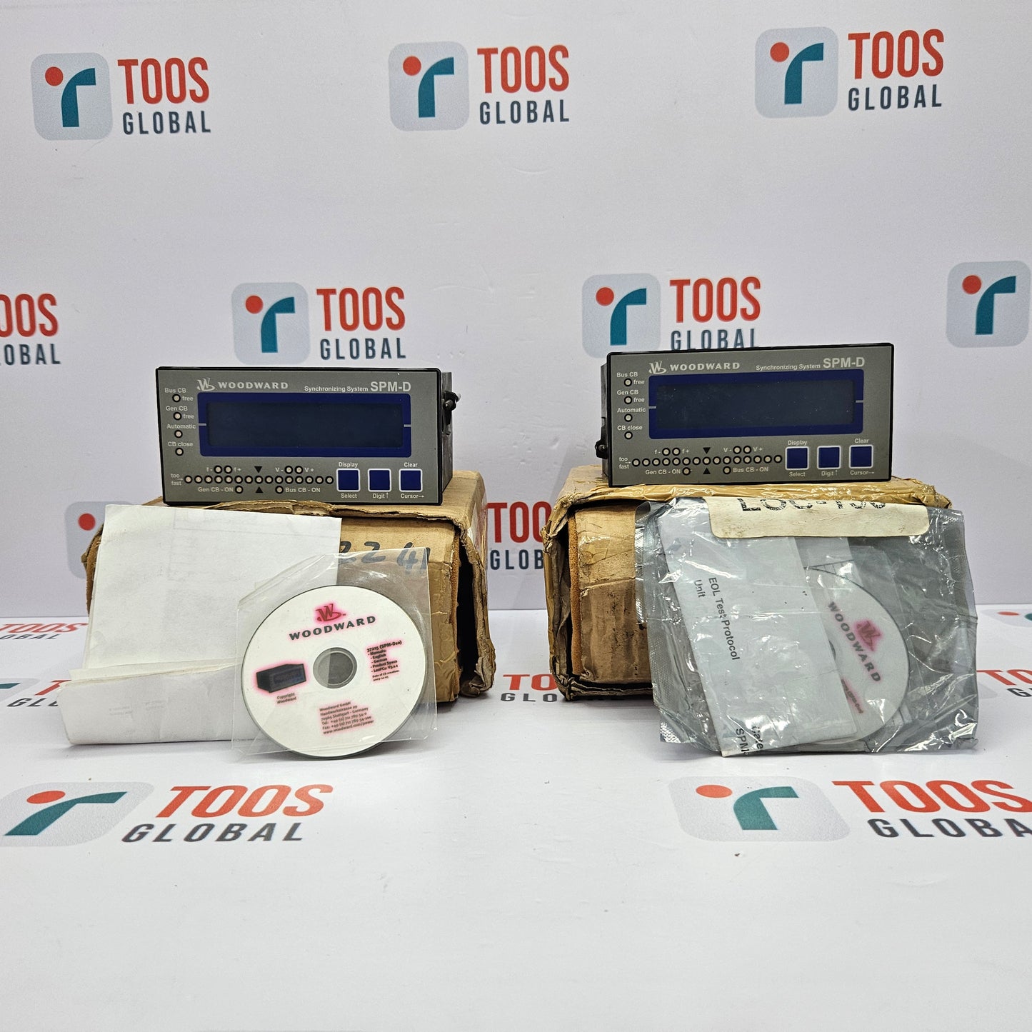 WOODWARD 8440-1667 REV B SPM-D1010B/XN with packaging and a CD on a TOOS GLOBAL branded background