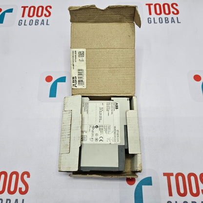 Electrical component in an open cardboard box on a TOOS GLOBAL branded background