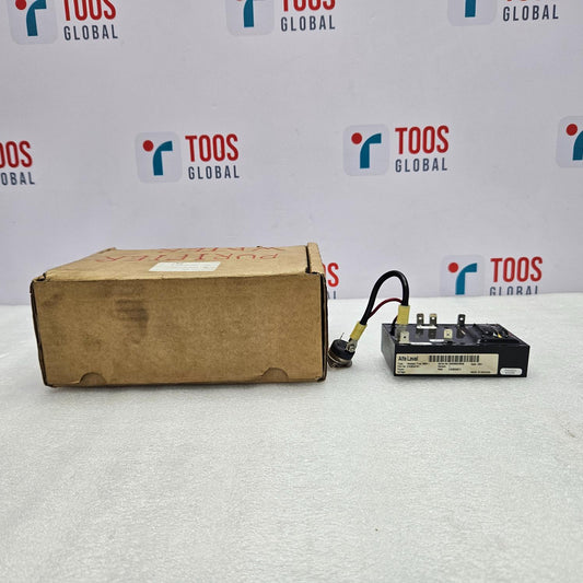 Cardboard box with a battery on a white surface with 'TOOS GLOBAL' branding in the background.