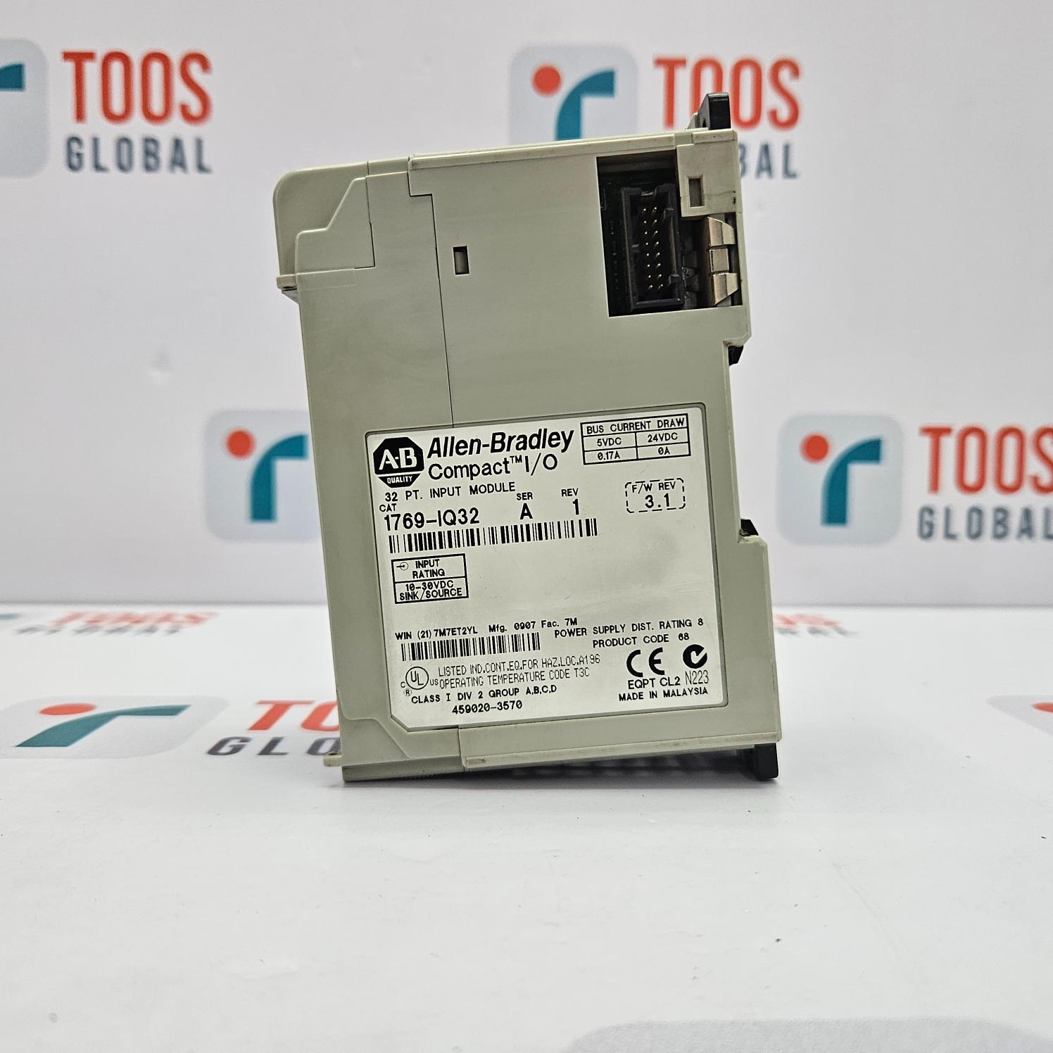 Allen-Bradley module on a white surface with blurred background