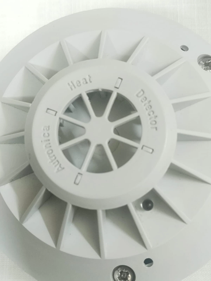 White heat detector with 'Nokian' branding on a white background