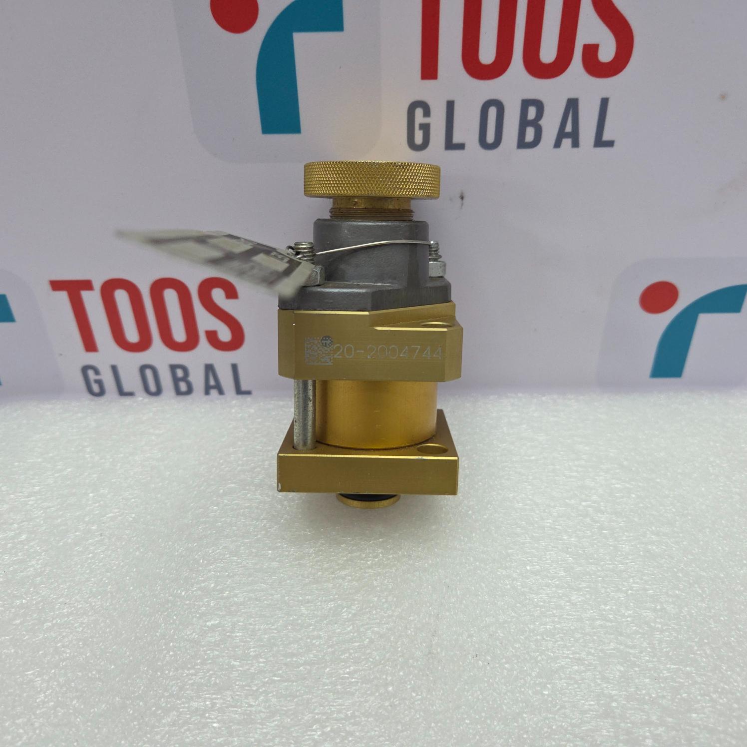 Gold valve on a white surface with 'TOOS GLOBAL' branding in the background.