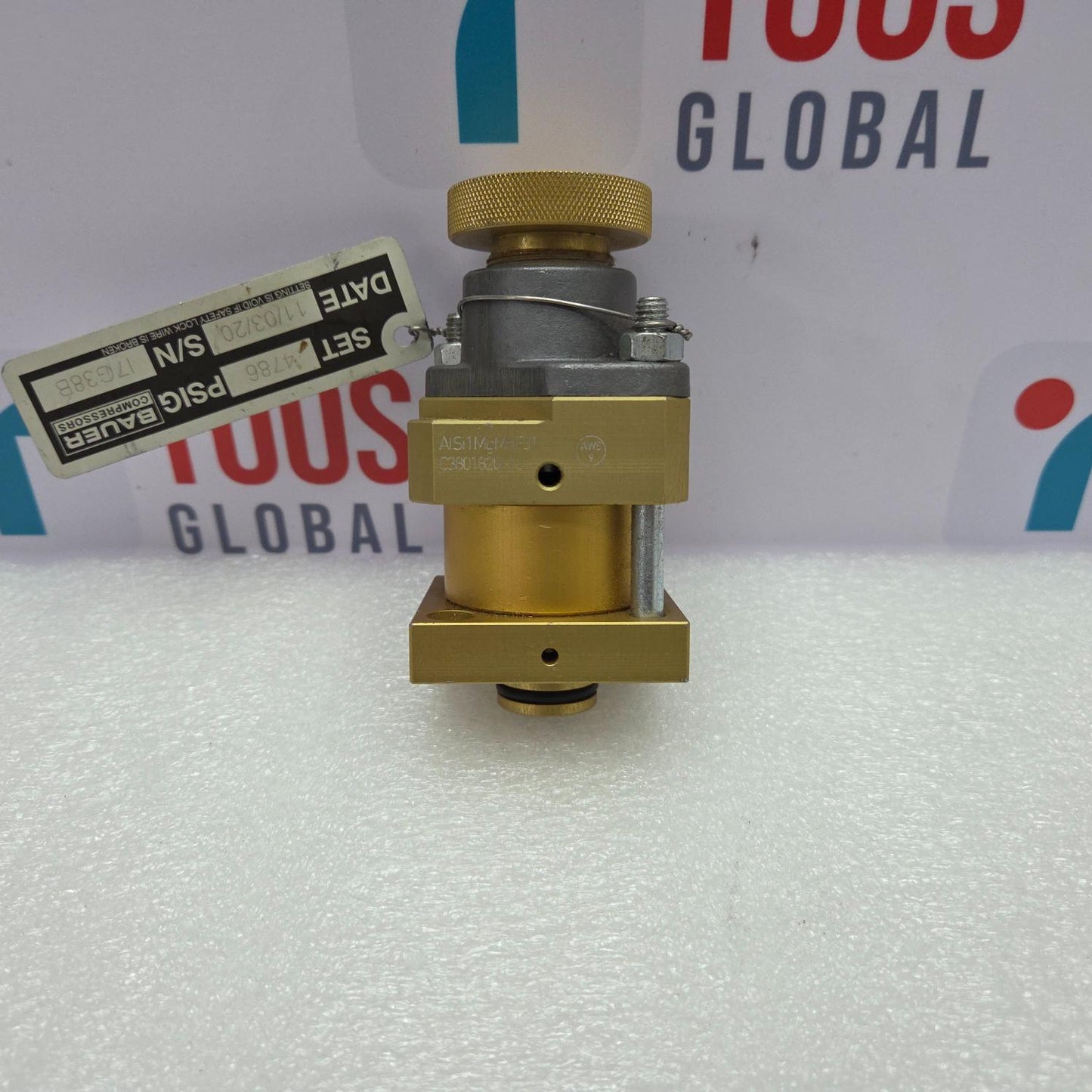 BAUER 059410  Brass valve on a white surface with 'TOOS GLOBAL' branding in the background.