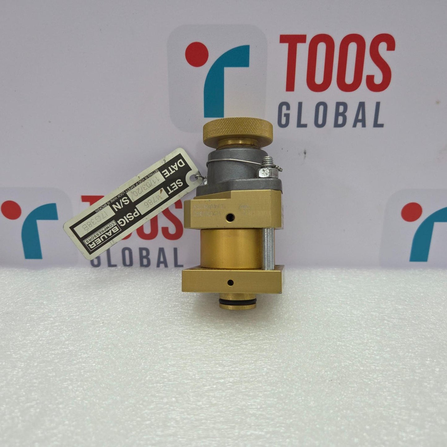 BAUER 059410 Brass valve with a tag on a white background with 'TOOS GLOBAL' branding.