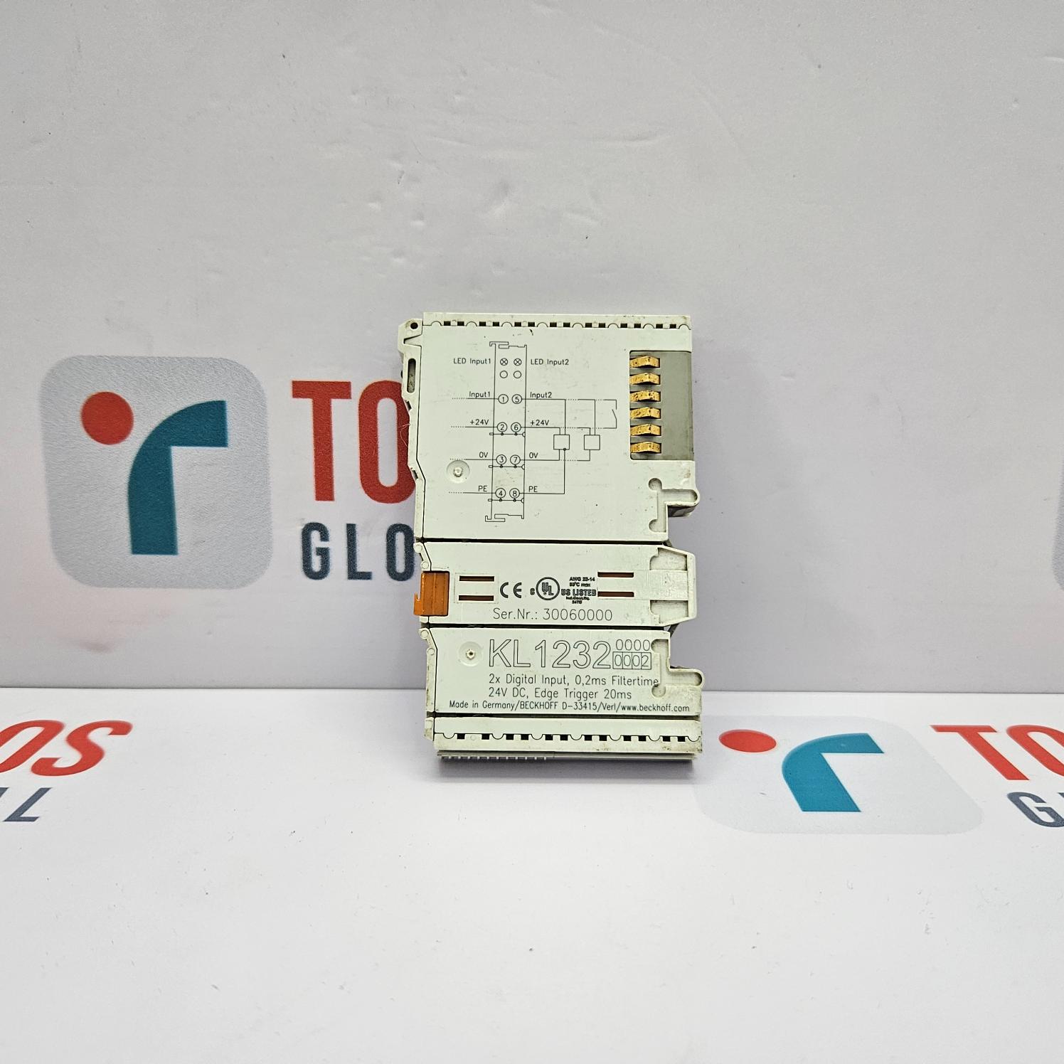 Electronic module with circuitry on a white background with a logo.