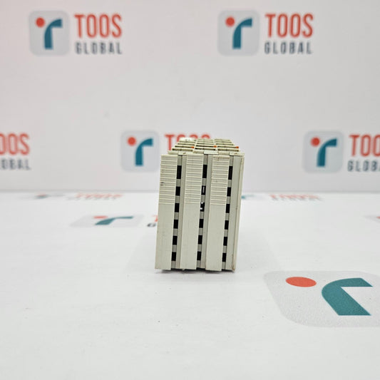 Stack of metallic blocks with 'TOOS GLOBAL' branding in the background