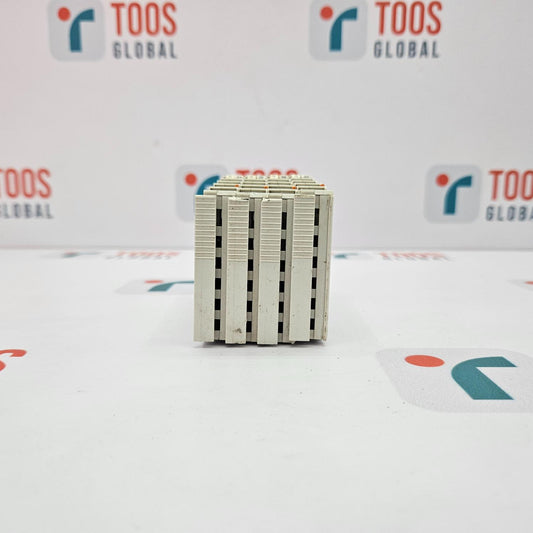 Stack of metallic blocks on a white background with 'TOOS GLOBAL' branding.