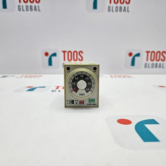 BIG M VH3-M6 TIMER 220VAC A BIG M VH3-M6 timer switch, 220VAC, displayed on a table with TOOS Global branding in the background.
