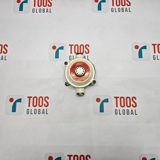 A CONSILIUM SALWICO SWM-1KL 57 heat detector, with a predominantly white body and red detailing, centered on a surface with the brand name 'TOOS GLOBAL' displayed.