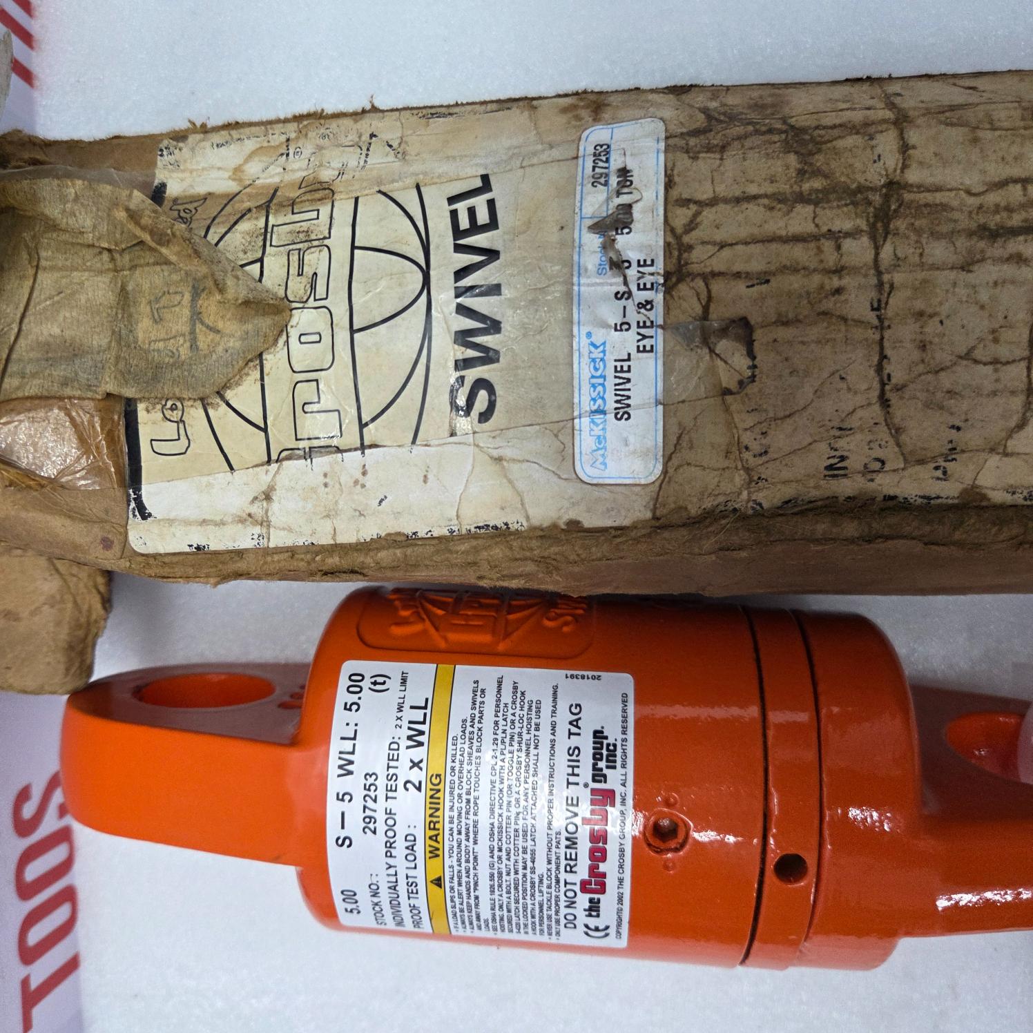 CROSBY SWIVEL 5-S-5 5.TON PAT NO-4669907 TACKLE BLOCK AND SHEAVE ASSEMBLY Orange tool with a label on a white background