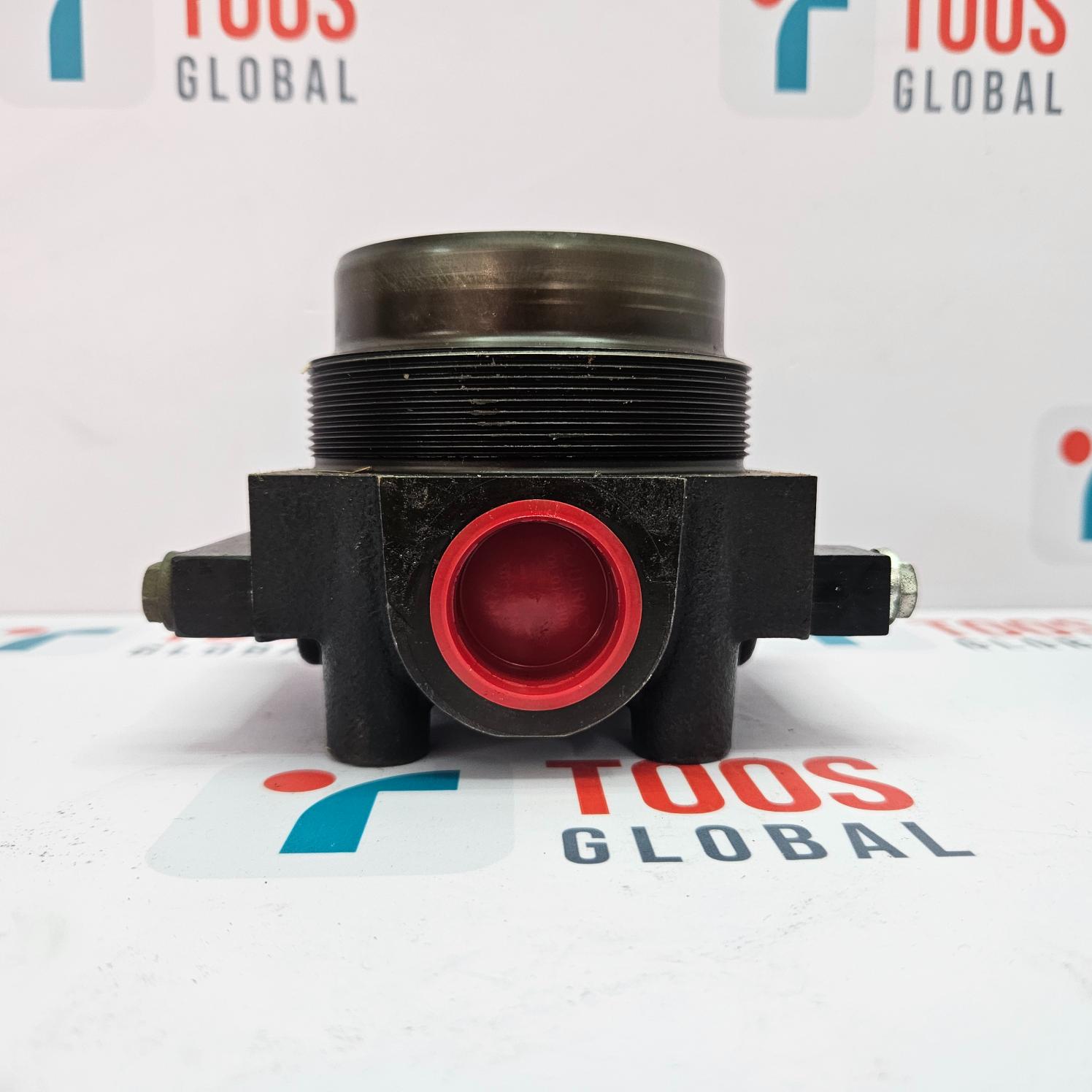 Black mechanical component with red interior on a branded background