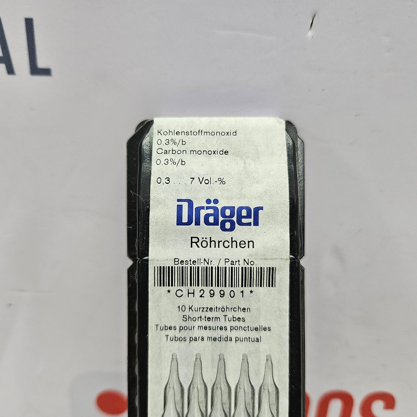 Drager CH29901 Carbon Monoxide 0.3B Gas Detection Tube with label on a gray background