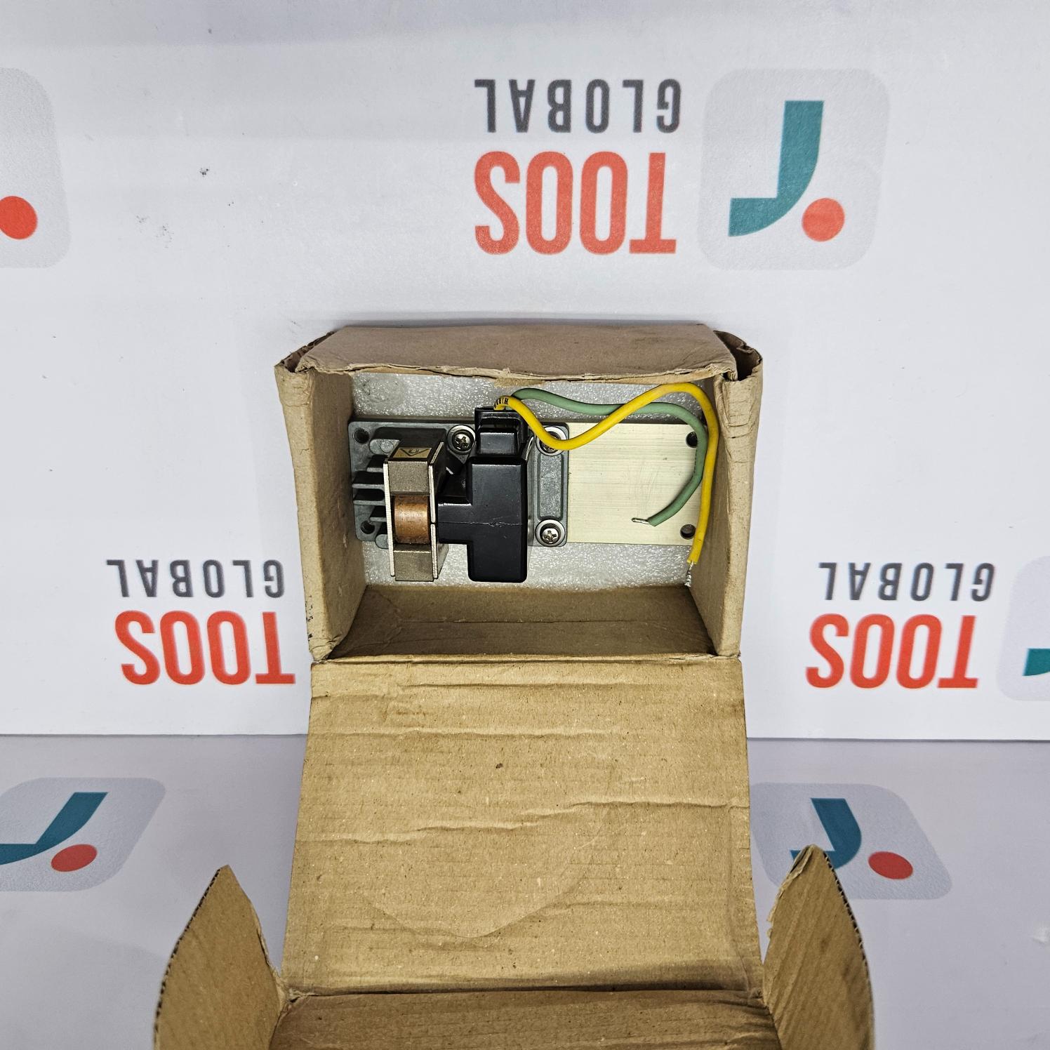 Open cardboard box with mechanical components inside, branded 'Tools Global' on a white background.
