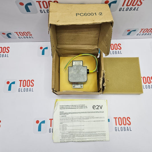 Yellow electronic component in an open cardboard box with a TOOS Global branded background