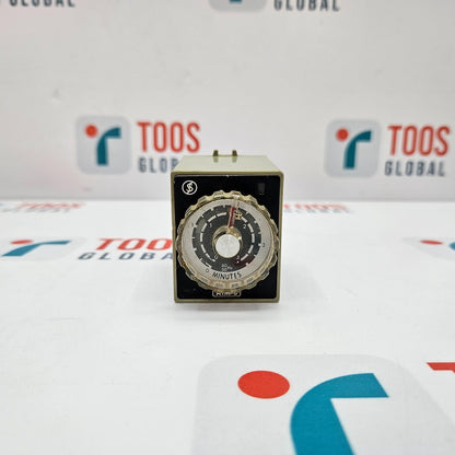 FUJI ELECTRIC ATM 3P MOTOR TIMER TIME RELAY FUJI ELECTRIC time relay with a black body and a dial, placed on a table with the TOOS GLOBAL logo.