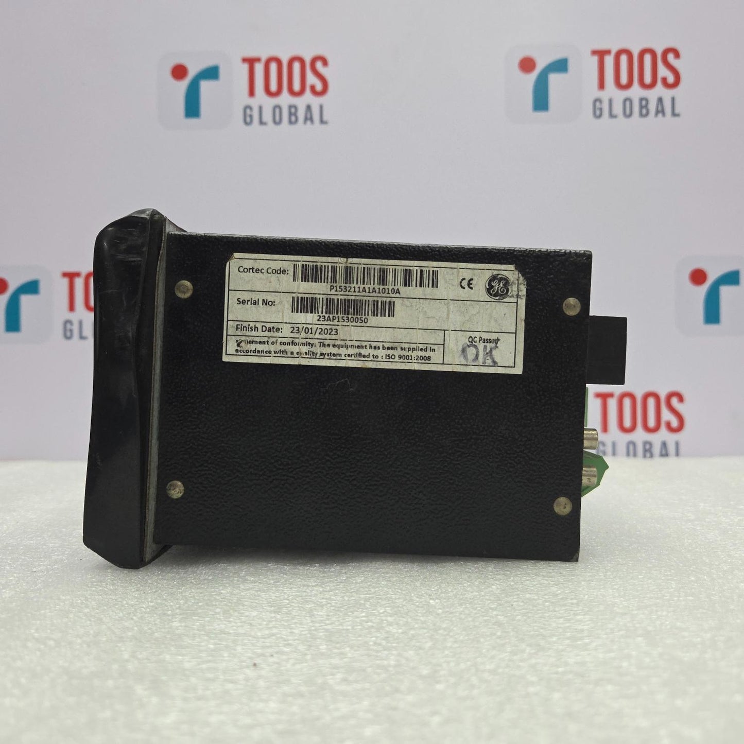 Black electronic module with a label on a white background featuring 'TOOS Global' branding.