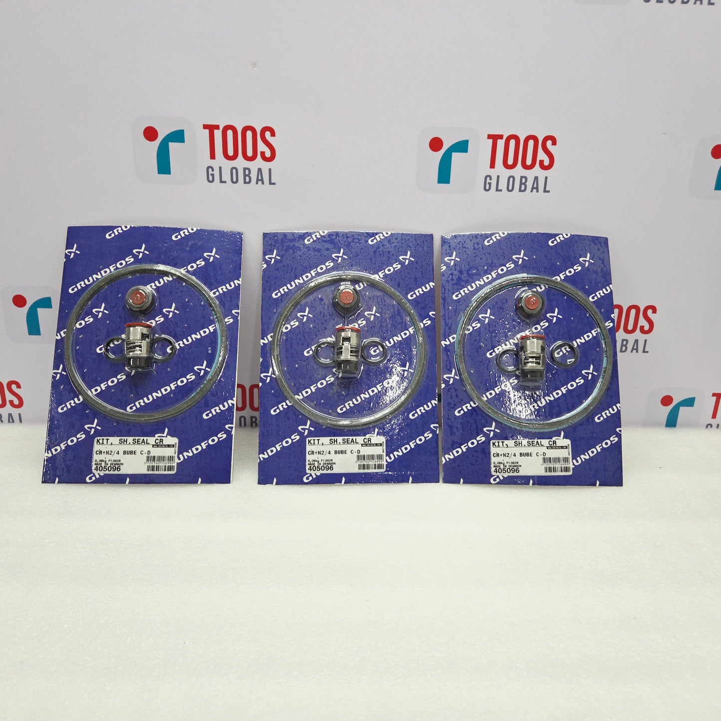 Three packages of Grundfos parts on a white background with TOOS Global branding.
