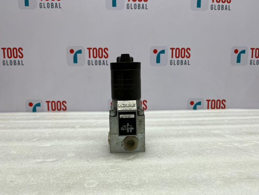 Mechanical valve on a white surface with 'TOOS GLOBAL' branding in the background.