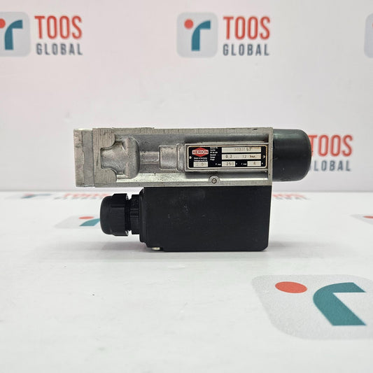 Mechanical component with 'TOOS GLOBAL' branding in the background