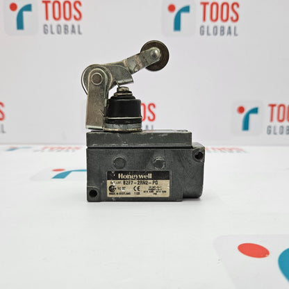 HONEYWELL BZE7-2RN2-PG MICRO SWITCH, a mechanical electrical switch, with a black housing and label, placed on a white surface.