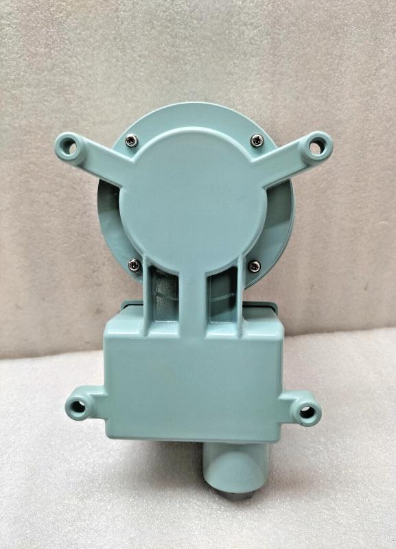 Light blue mechanical component on a beige background