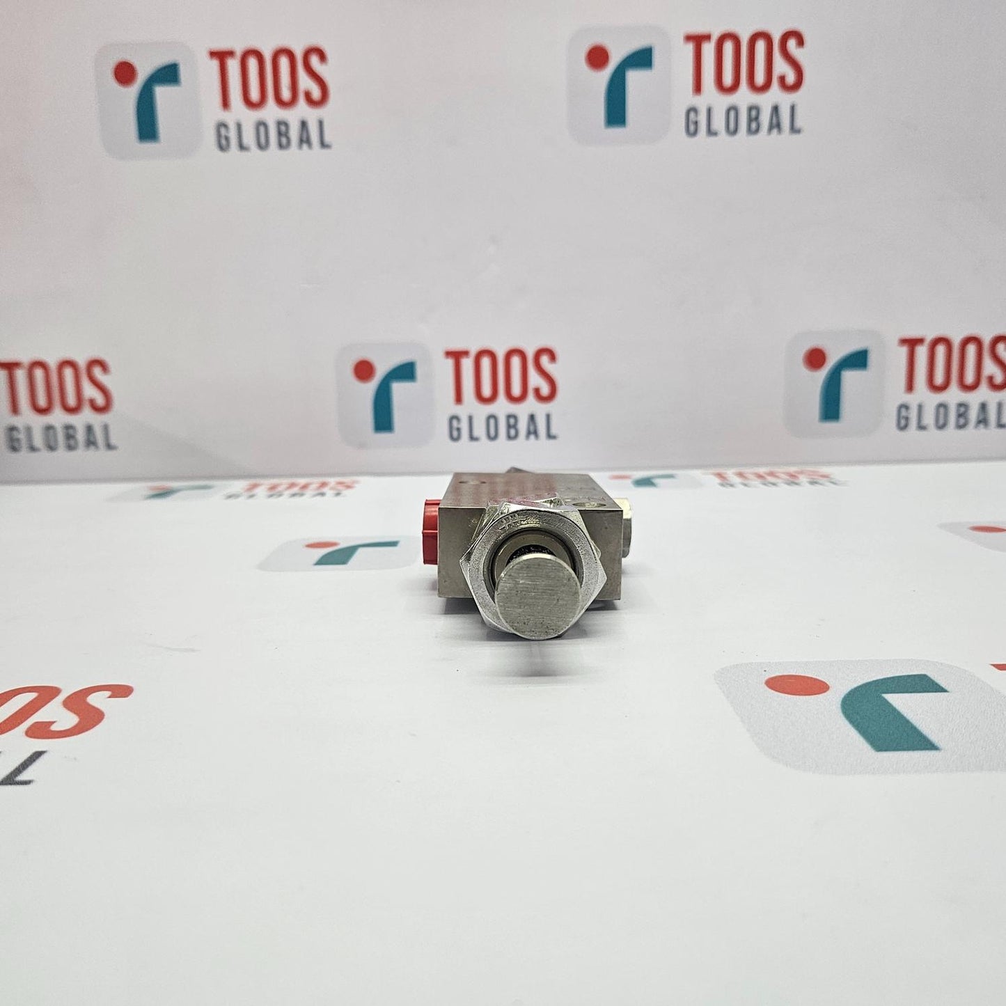Metal component on a white background with 'TOOS GLOBAL' branding.