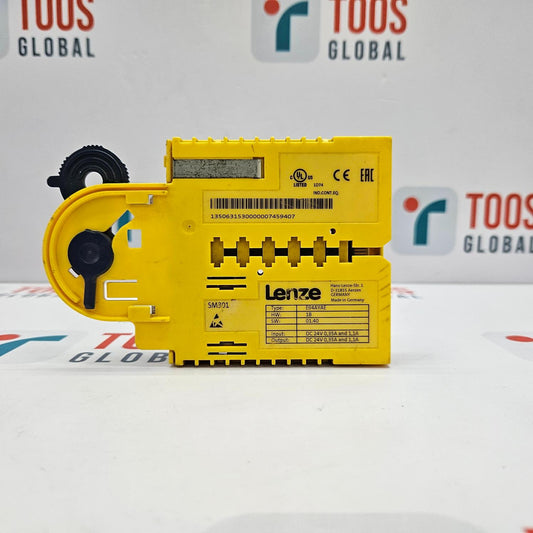 Yellow industrial component with 'Lenze' branding on a white background with 'TOOS GLOBAL' logos.