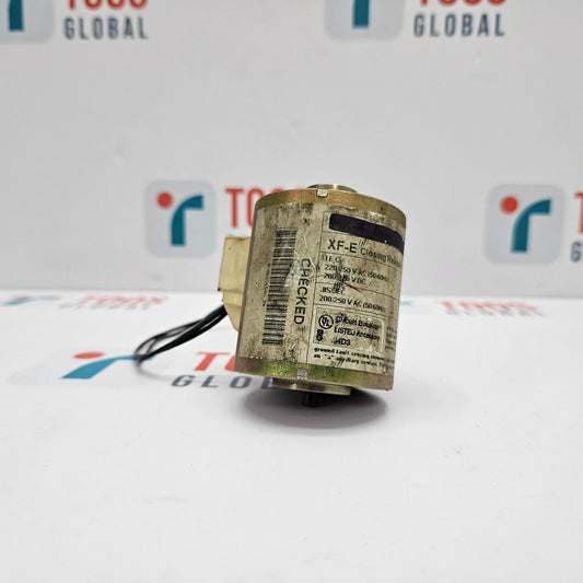 Small cylindrical electronic component with a barcode label on a white background with 'TCS Global' branding.