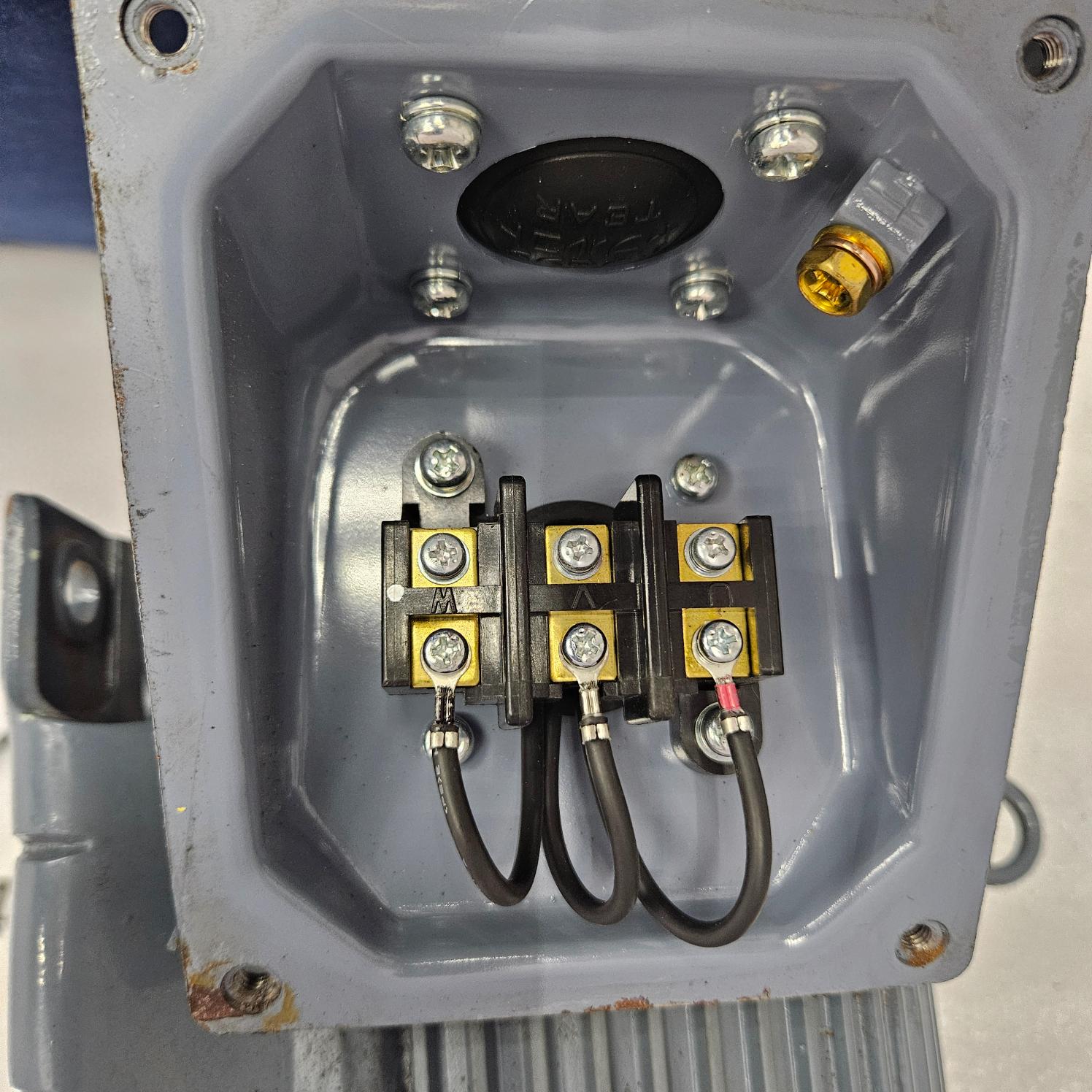 Close-up of a electrical junction box with wiring and connectors.