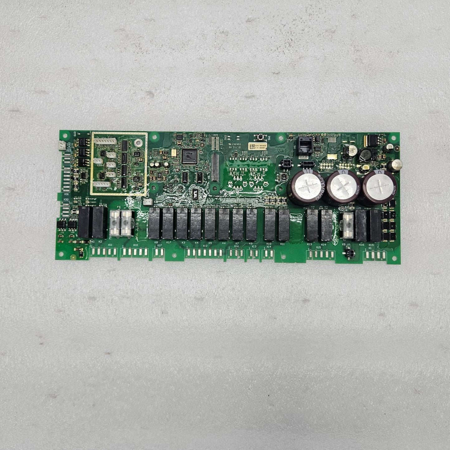 MKN CONTROL BOARD - 10016428  Electronic circuit board on a gray surface