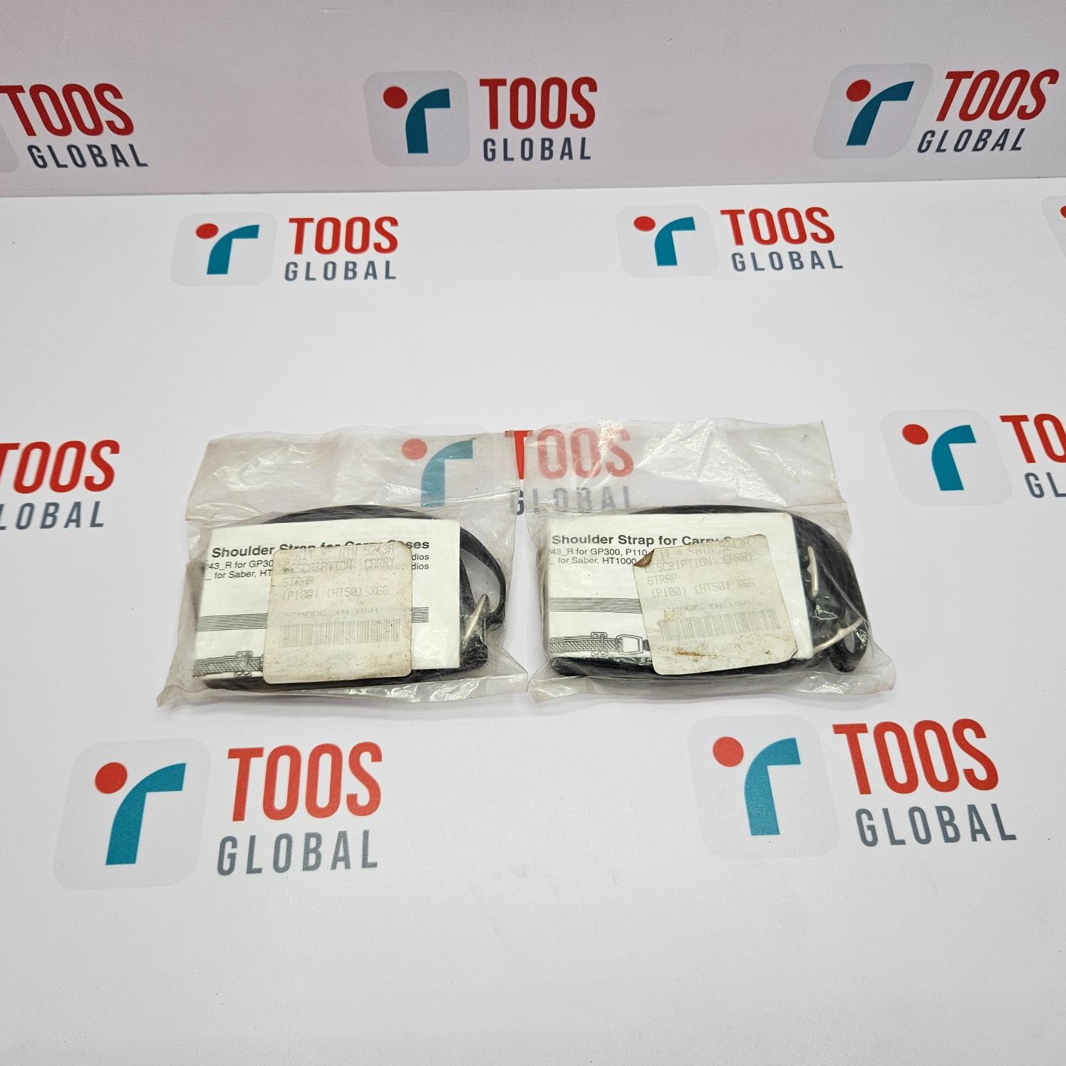 Two sealed packages with labels indicating the product is a MOTOROLA NTN523A Adjustable Carrying Shoulder Strap, displayed on a background with the TOOS GLOBAL logo.