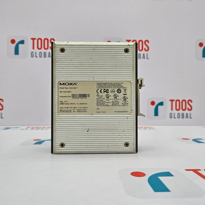 A MOXA EDS-308-T 8-PORT UNMANAGED ETHERNET SWITCH placed on a table with a TOOS GLOBAL background.