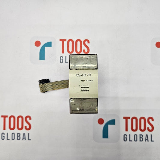Electronic component with 'TOOS GLOBAL' branding on a white background