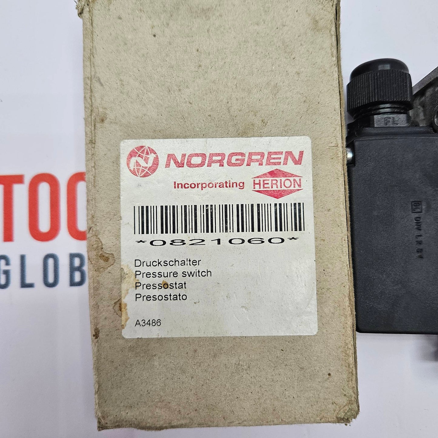 Norgren pressure switch packaging with label on a white background