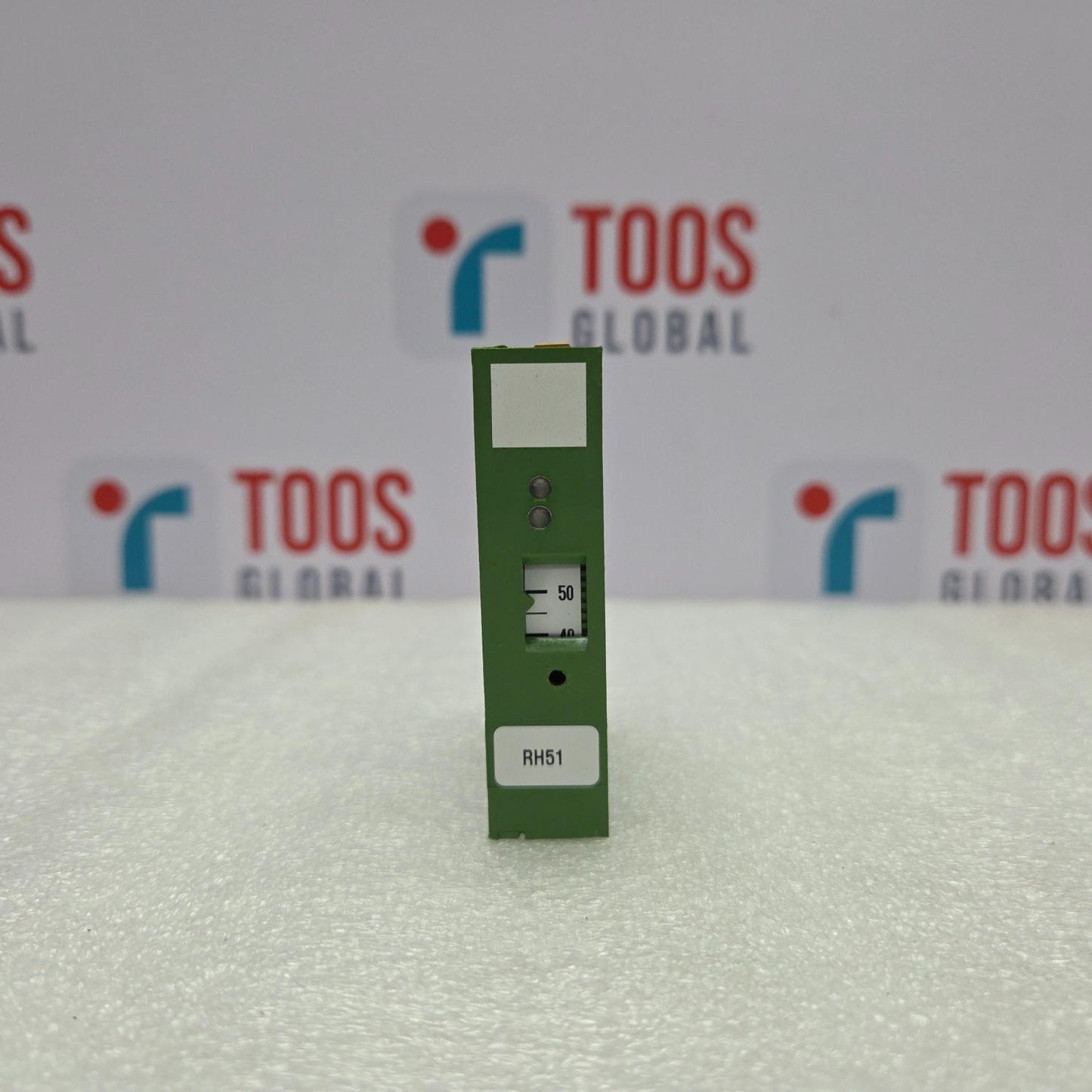 Green NORIS RH51 electronic component with 'TOOS GLOBAL' branding in the background