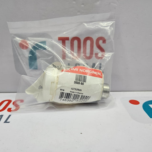 White valve in clear plastic packaging with IMI Norgren label on a white background