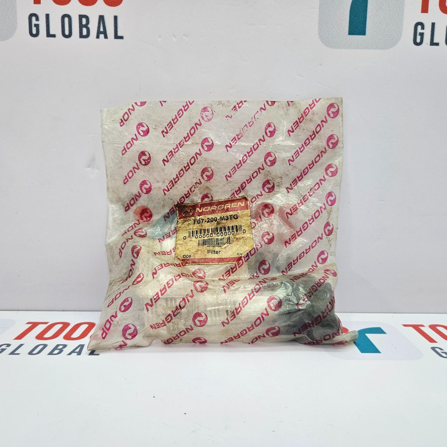 Packaged filter with Norgren branding on a white background