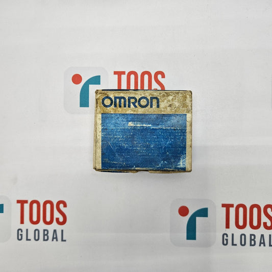 An OMRON limit switch with model number XE-Q21-2 and dimensions 25x6ra displayed on a surface with the brand logo visible in the background.